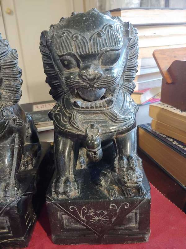 A pair of Antique Chinese Foo Dogs (Lions)