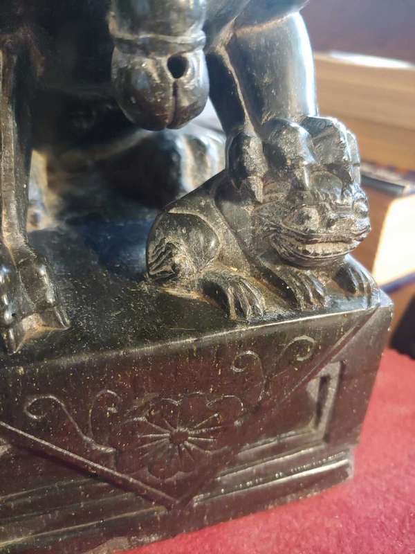A pair of Antique Chinese Foo Dogs (Lions)