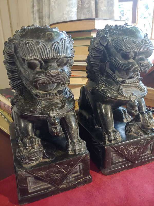 A pair of Antique Chinese Foo Dogs (Lions)