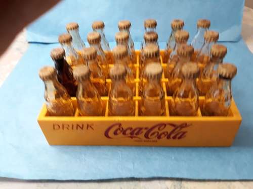 Coca Cola Vintage Miniature Crate with 24 Miniature Coke Bottles.1970-60`s  R 709.00 View scans