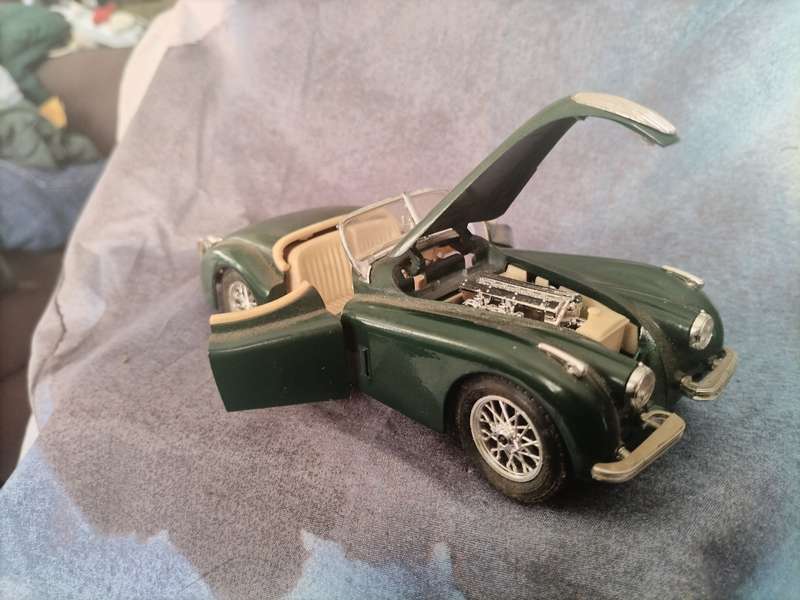 Green and beige convertible old mobile