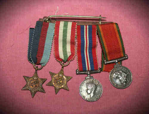 4 World War 2 Mini Medals with their Ribbons
