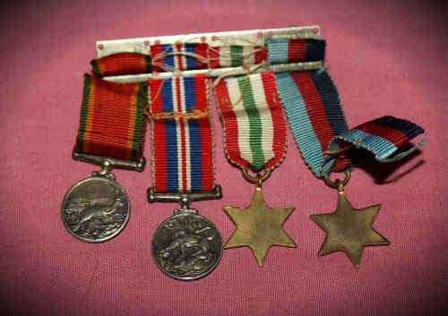 4 World War 2 Mini Medals with their Ribbons