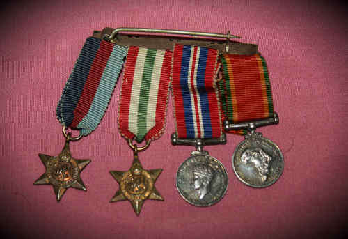 4 World War 2 Mini Medals with their Ribbons