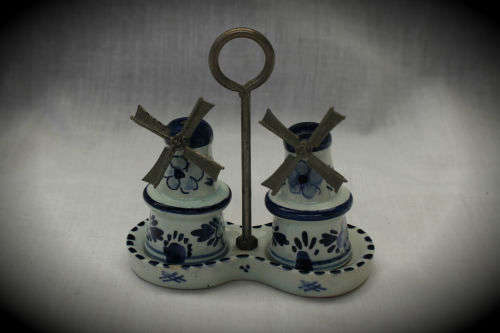 Blue and white Dutch salt and pepper set on stand -small chip on stand and on bottom 90x90x46mm