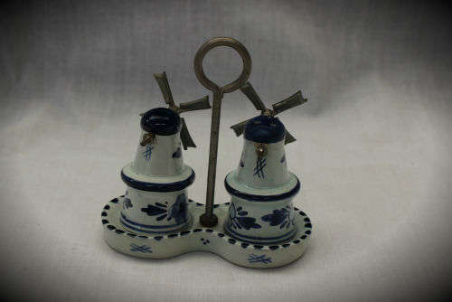 Blue and white Dutch salt and pepper set on stand -small chip on stand and on bottom 90x90x46mm
