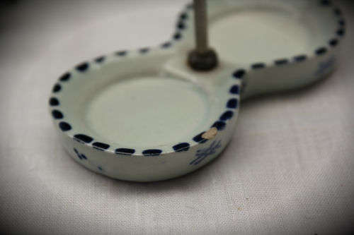 Blue and white Dutch salt and pepper set on stand -small chip on stand and on bottom 90x90x46mm