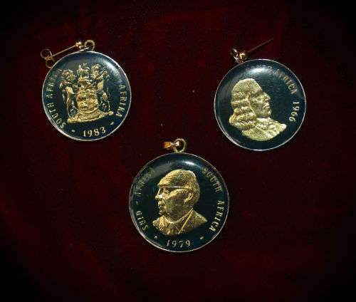 1979 R1 coin (Nicolaas J. Diederichs) turned into a pendant and 1966 and 1983 50c coins into earings