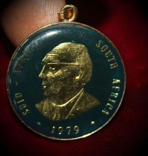 1979 R1 coin (Nicolaas J. Diederichs) turned into a pendant and 1966 and 1983 50c coins into earings