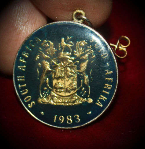 1979 R1 coin (Nicolaas J. Diederichs) turned into a pendant and 1966 and 1983 50c coins into earings