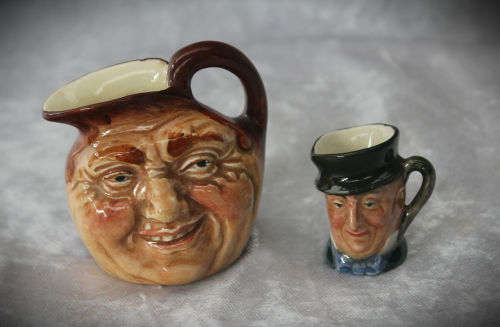 2 small Royal Doulton character jugs -John Barleycorn and Mr Micawber- 1 small paint chip