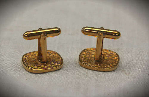 a pair of Cufflinks