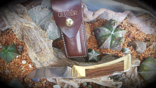 1980's Gerber 97223 Folding Knife Portland OR. USA . with Sheath as new