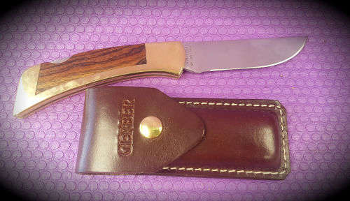 1980's Gerber 97223 Folding Knife Portland OR. USA . with Sheath as new