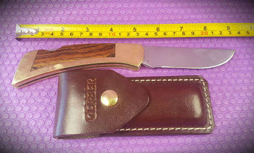 1980's Gerber 97223 Folding Knife Portland OR. USA . with Sheath as new