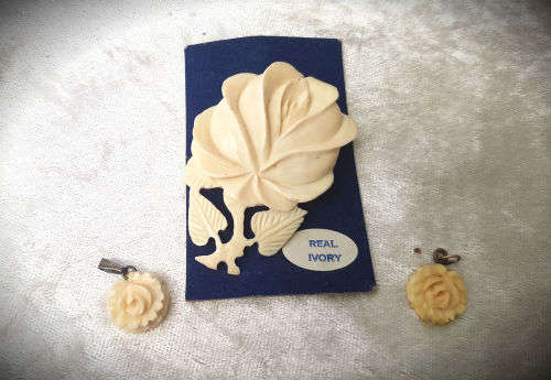 Real Ivory Pendant with 2 faux ivory flowers- Compare size with R2 in Photos
