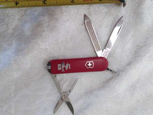 Vintage Victorinox Swiss  pocket knife with sheath - see condition piece of cover chipped off