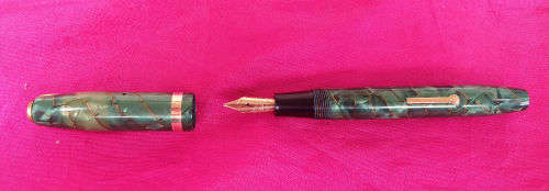1950's Conway & Steward Fountain Pen Model 84 14ct Gold Nib Green Marble with Gold Veins.Used condit
