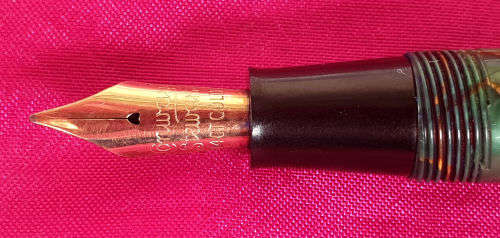 1950's Conway & Steward Fountain Pen Model 84 14ct Gold Nib Green Marble with Gold Veins.Used condit