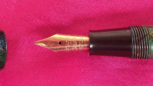 1950's Conway & Steward Fountain Pen Model 84 14ct Gold Nib Green Marble with Gold Veins.Used condit