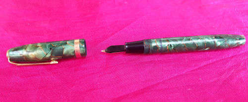1950's Conway & Steward Fountain Pen Model 84 14ct Gold Nib Green Marble with Gold Veins.Used condit