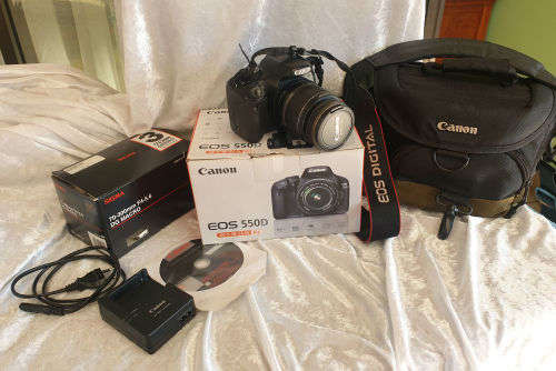 Canon E0S 550D Digital SLR Camera & Cannon EF-S 18-55 IS Lens Kit + Sigma 70-300mm Lens plus ..