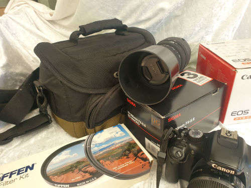Canon E0S 550D Digital SLR Camera & Cannon EF-S 18-55 IS Lens Kit + Sigma 70-300mm Lens plus ..