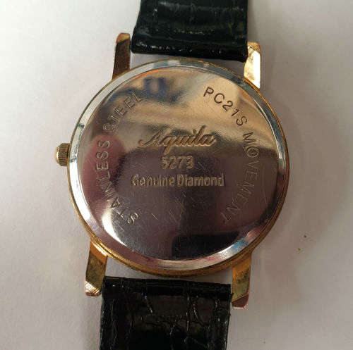 Vintage Aquila 5273 Quartz Genuine Diamond PC21S movement-working -- strap is worn