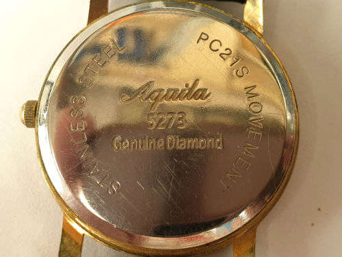 Vintage Aquila 5273 Quartz Genuine Diamond PC21S movement-working -- strap is worn
