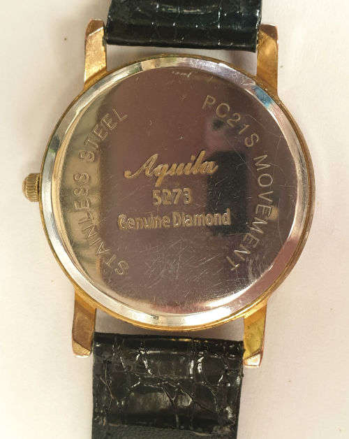 Vintage Aquila 5273 Quartz Genuine Diamond PC21S movement-working -- strap is worn