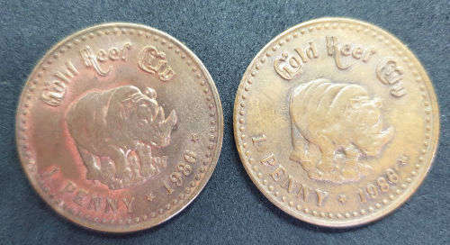 2 1986 Gold Reef City 1 pennie Tokens