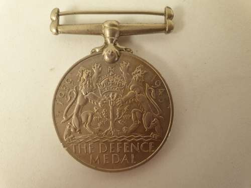 WW2  War Medal 19391945 and a Defence Medal member 327206 - plus a 1994 miniature medal