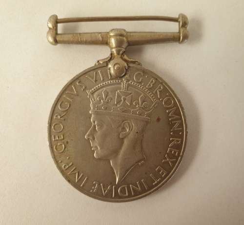 WW2  War Medal 19391945 and a Defence Medal member 327206 - plus a 1994 miniature medal