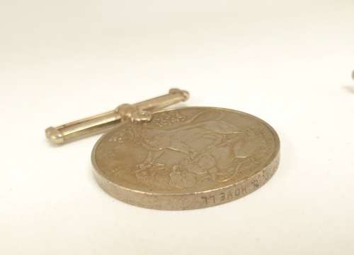 WW2  War Medal 19391945 and a Defence Medal member 327206 - plus a 1994 miniature medal