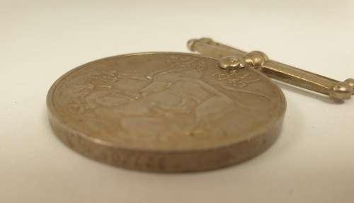 WW2  War Medal 19391945 and a Defence Medal member 327206 - plus a 1994 miniature medal