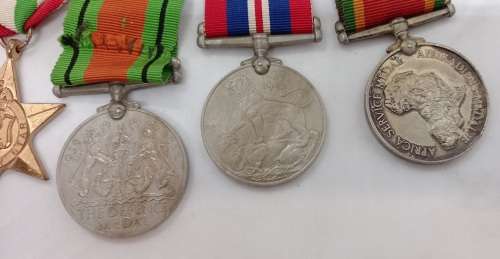 Set of 6 Full size WW2 Medals Issued to C.A Buys  Number is 101045  -Engraved