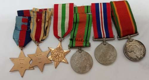 Set of 6 Full size WW2 Medals Issued to C.A Buys  Number is 101045  -Engraved