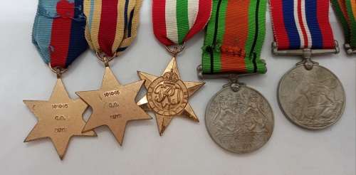 Set of 6 Full size WW2 Medals Issued to C.A Buys  Number is 101045  -Engraved