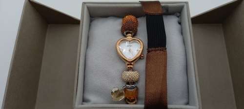 Unused Saga "Fairy Whisper" Limited edition Bracelet watch with Swarovski Crystal charms.
