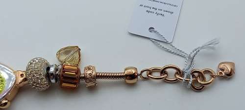 Unused Saga "Fairy Whisper" Limited edition Bracelet watch with Swarovski Crystal charms.