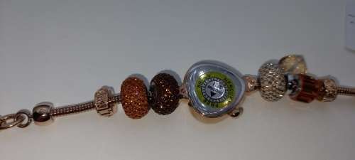 Unused Saga "Fairy Whisper" Limited edition Bracelet watch with Swarovski Crystal charms.