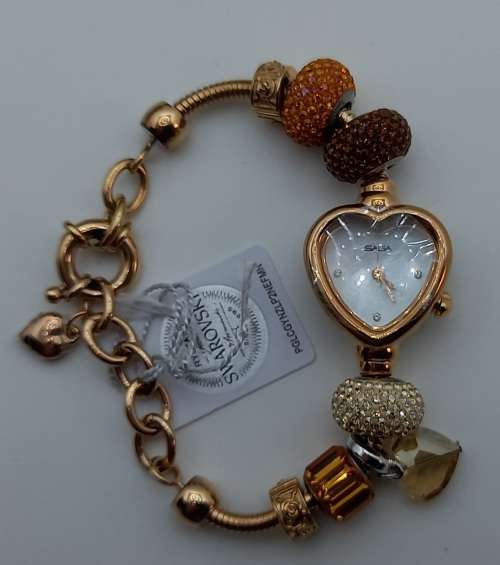 Unused Saga "Fairy Whisper" Limited edition Bracelet watch with Swarovski Crystal charms.