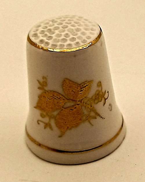 A Collection of 9 Vintage Bone China Porcelain Thimbles