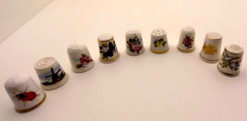 A Collection of 9 Vintage Bone China Porcelain Thimbles