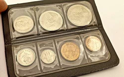 7 Vintage 1964-1977 Rhodesia Coins in Plastic Coin Flip -Uncirculated