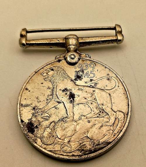 WW2 1939-1945 Full size Medal issued to 75641 T.O Weir engraved