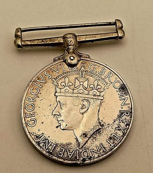 WW2 1939-1945 Full size Medal issued to 75641 T.O Weir engraved