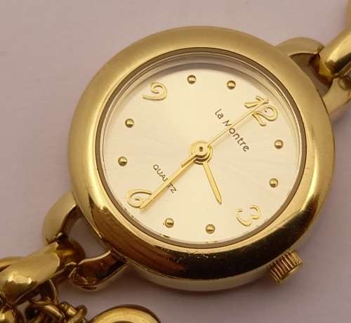 Pre-owned La Montre Quarts 60WLGRC78 Ladies watch with Charm bracelet-Working