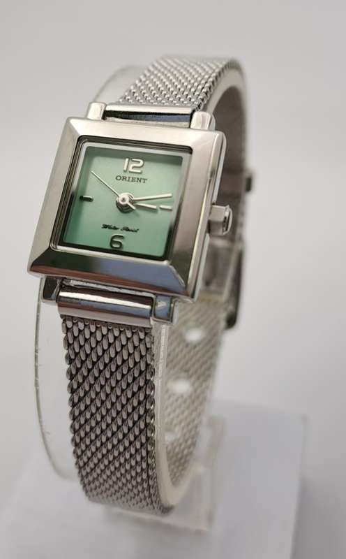Pre-owned  Vintage Un-Used Orient ladies Watch -Working with new battery-still in packaging