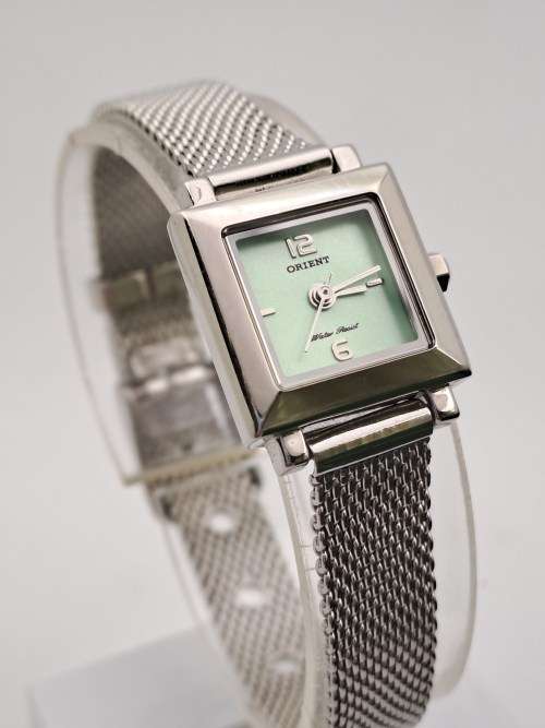Pre-owned  Vintage Un-Used Orient ladies Watch -Working with new battery-still in packaging